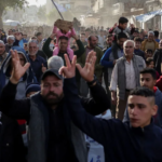 Palestinians attend a rally calling for an end to the war in Beit Lahia, Gaza.