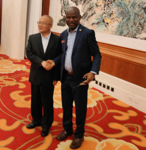 Williams, right, during a visit to Asia